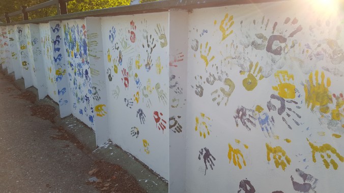 Appalachian Trail Approaching North Adams, Massachusetts Handprints of children on bridge